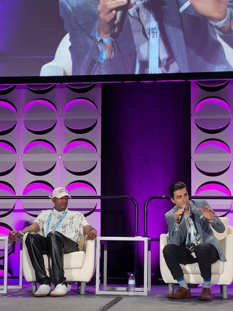 Dalton speaking on a conference panel